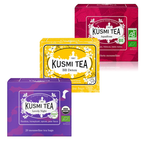 Three boxes of Kusmi Tea on a white background