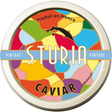A colorful tin can label for Sturia Baerii Caviar, depicting various colors and the image of a sturgeon, indicating the product is vintage caviar.