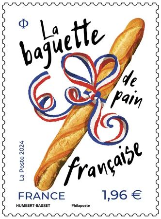 A collectible postage stamp featuring an illustration of a baguette with a ribbon and the text 'La baguette de pain française', along with the value of 1,96€.