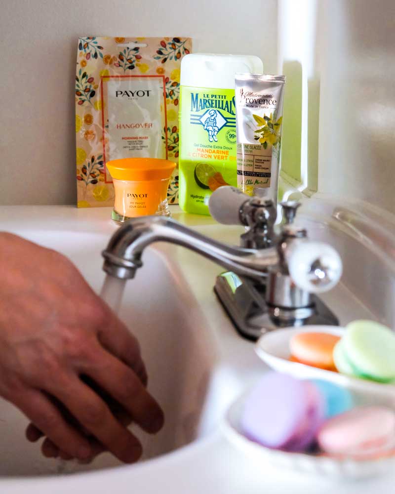 french beauty product in a bathroom, including shower gel and french skin care