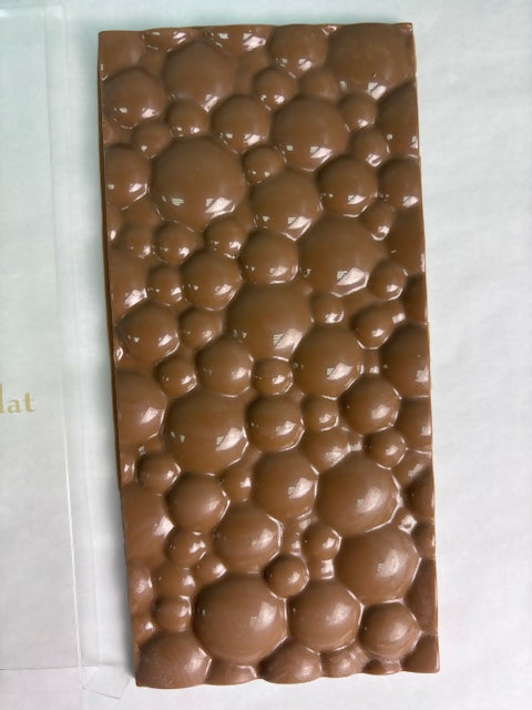 Love is in the air - a Duo of Small-Batch Artisanal Dark Chocolate bar with red hearts in white chocolate paired with a luscious milk chocolate Bar – Crafted by L’Atelier du Chocolat