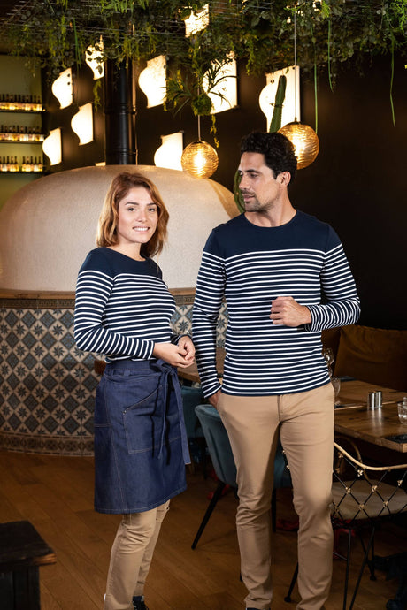 couple wearing a navy French Striped top