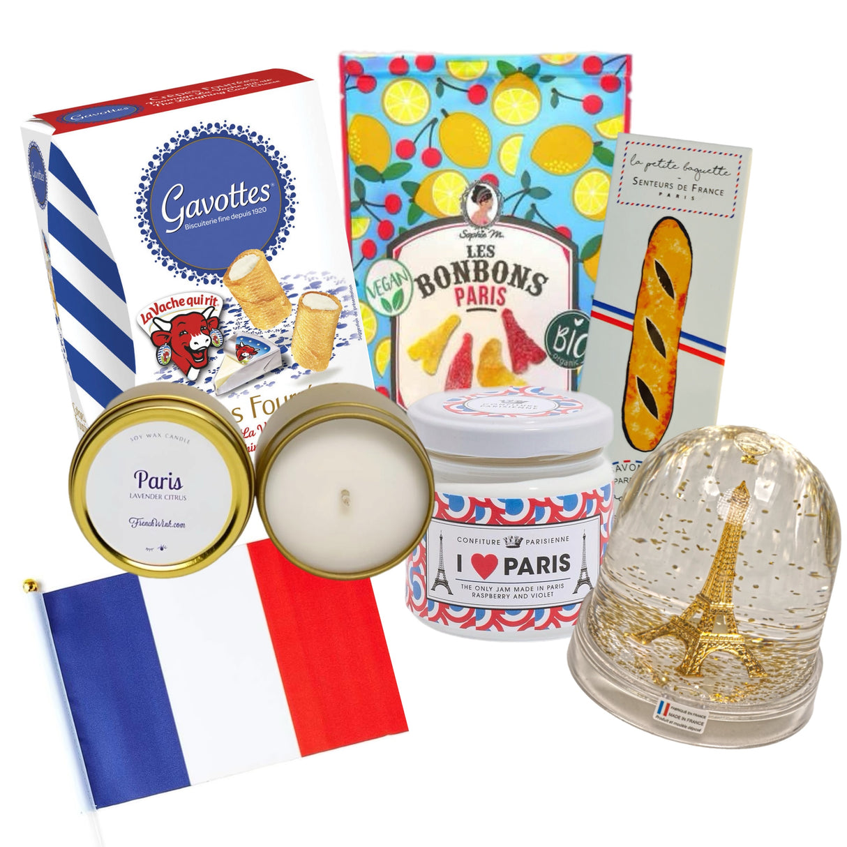 Collection of French-themed products including candles, baguette soap, and an Eiffel Tower snow globe