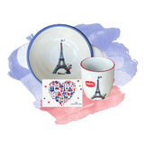 Ceramic set with Eiffel Tower design on a colorful watercolor background