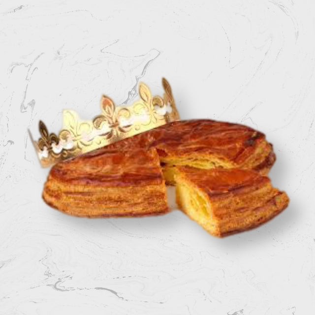 Galette des Rois cut on a table