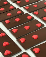 Love is in the air - a Duo of Small-Batch Artisanal Dark Chocolate bar with red hearts in white chocolate paired with a luscious milk chocolate Bar – Crafted by L’Atelier du Chocolat