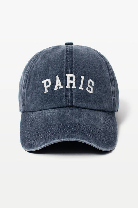 Blue cap with 'PARIS' text on a white background