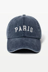 Blue cap with 'PARIS' text on a white background