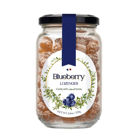 Jar of blueberry candies with a label on a white background