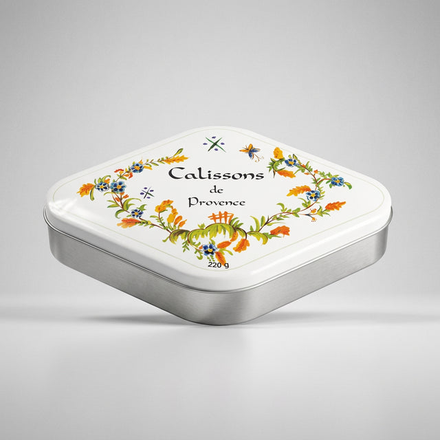 Decorative box for Calissons de Provence with floral designs on a white background
