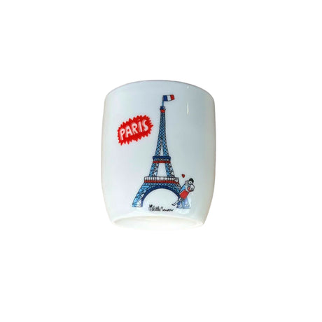 Ceramic mug with Eiffel Tower design and 'Paris' text on a gray background