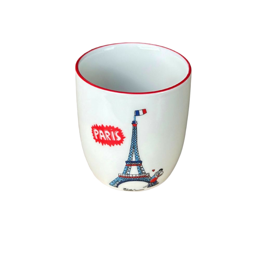 Ceramic cup with Eiffel Tower design and 'Paris' text on a gray background