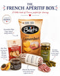 A French apéritif box set featuring a bag of Brets Camembert chips, a bag of Traditional Mini Toasts, a roll of Duitzou Salami, a jar of Cornichons, and a jar of Tartines, arranged on a white background with French text labels.