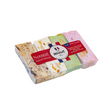 Assorted nougat package with visible flavors on a beige background