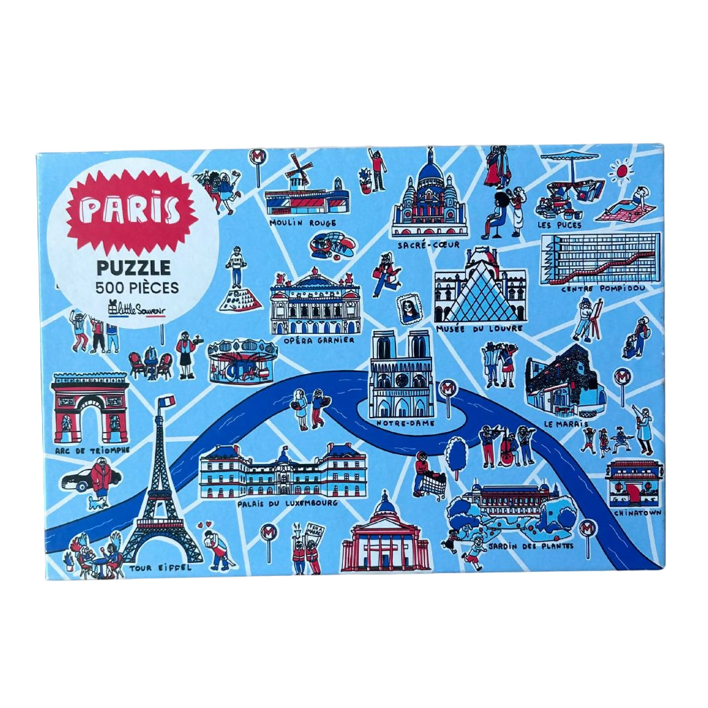 Paris-themed puzzle box with illustrations of famous landmarks on a blue background