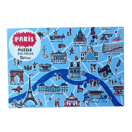 Paris-themed puzzle box with illustrations of famous landmarks on a blue background