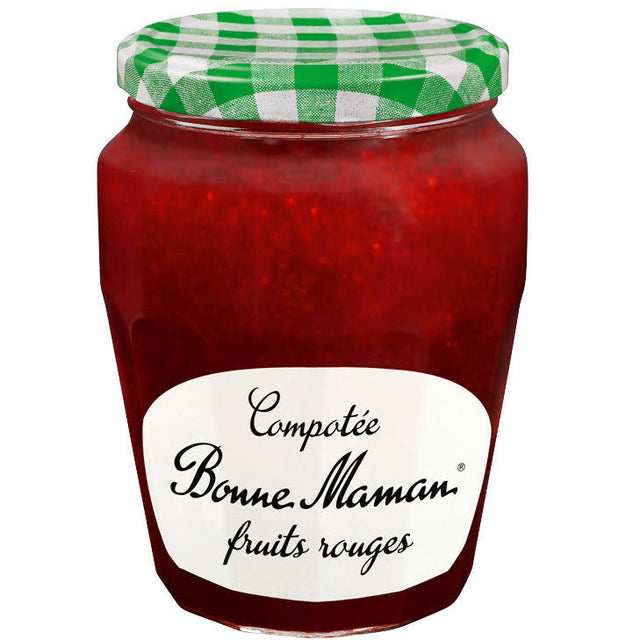 Jar of Bonne Maman red fruit preserve with a checkered lid on a white background