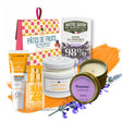Collection of beauty and skincare products with lavender and orange accents on a white background.