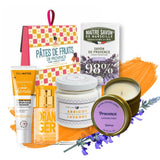 Collection of beauty and skincare products with lavender and orange accents on a white background.