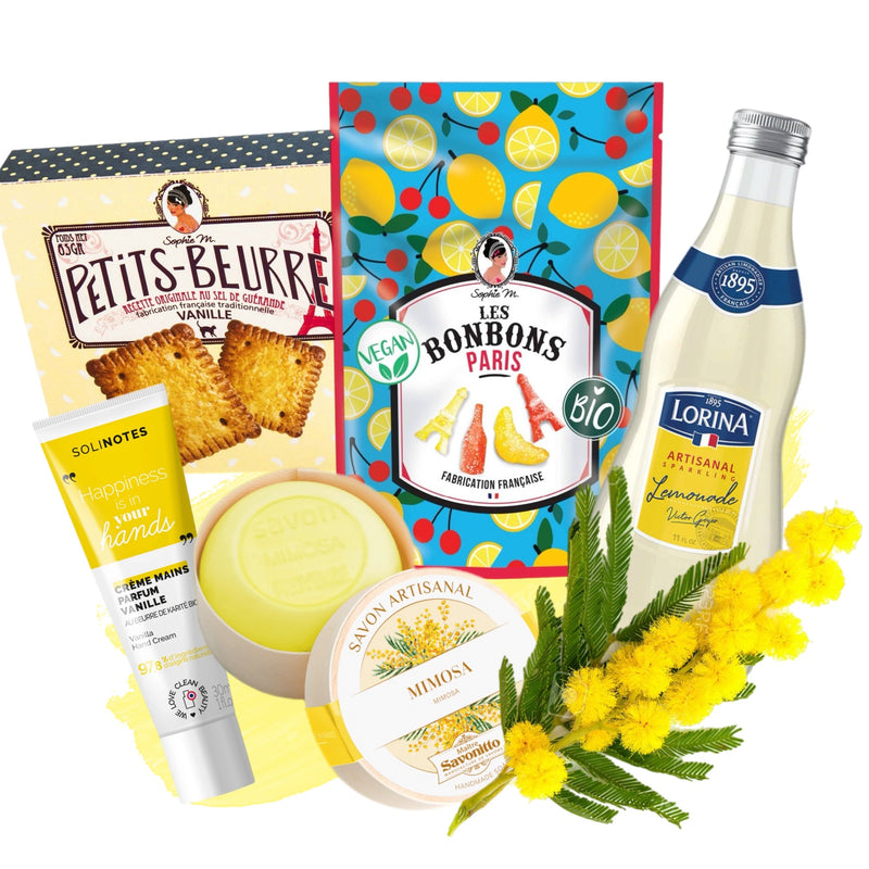 A collection of French gourmet treats and luxury self-care products including biscuits, sparkling lemonade, mimosa soap, vanilla hand cream, and organic candies, presented with spring flowers and a 'Petits Beurre' packaging backdrop.